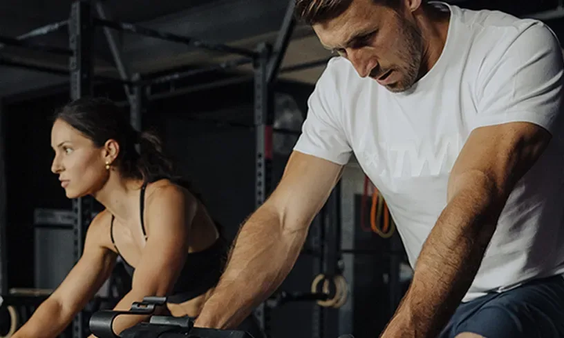 TWL brand athletes training in gym – Purple Perks offer.
